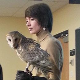 image of Walker holding owl