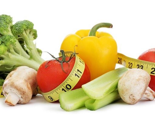 image of vegetables with measuring tape wrapped around them